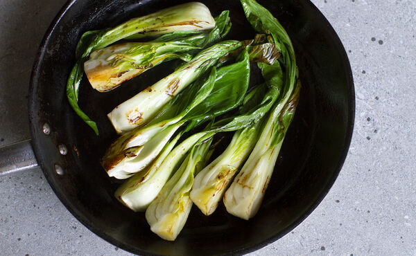 fresh green bok choy on a plate